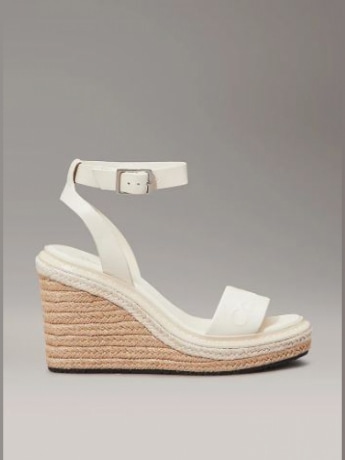 Calvin Klein scarpe bianche donna sandali con zeppa in tessuto logo sul davanti